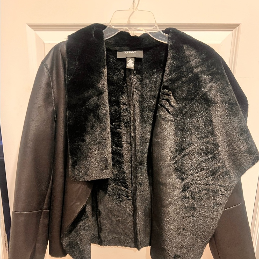 Black coat with fur lining
New with tags